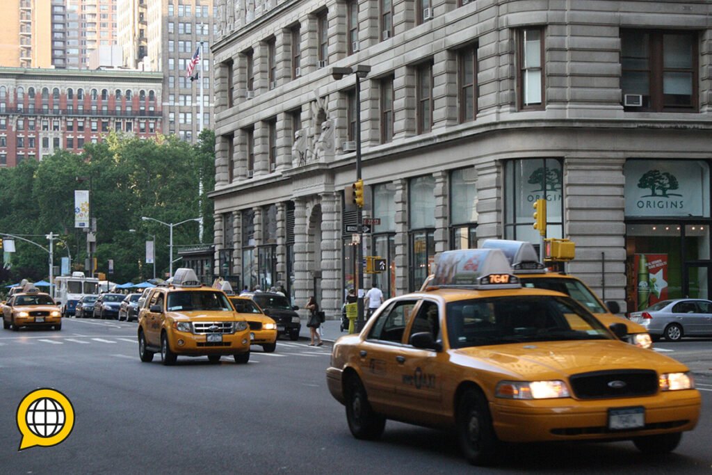 Flatiron Building ground floor with yellow cabs